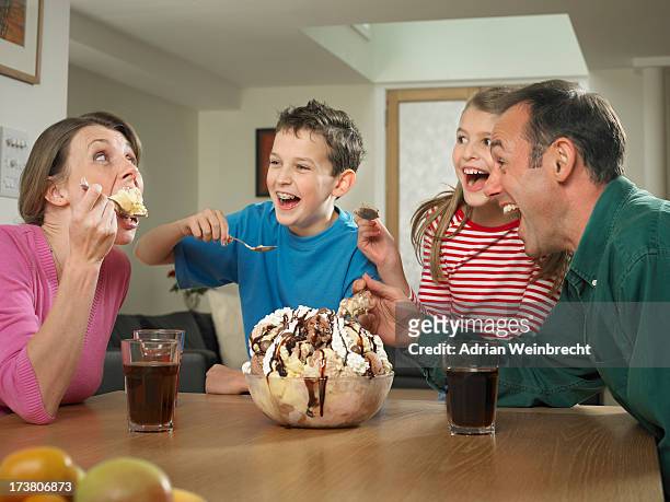 family eating ice cream together - sundae stock pictures, royalty-free photos & images