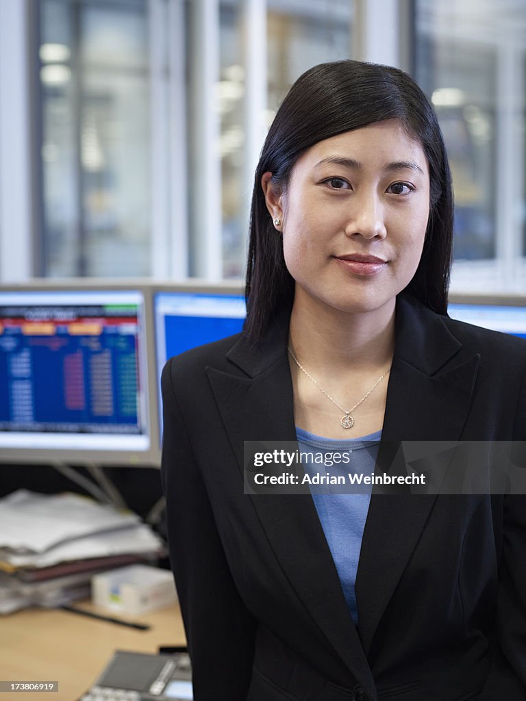 Businesswoman smiling in office