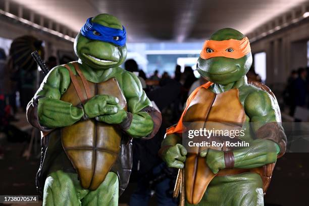 Cosplayers pose as Teenage Mutant Ninja Turtles during New York Comic Con 2023 - Day 4 at Javits Center on October 15, 2023 in New York City.