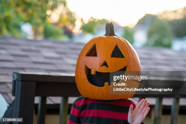 pumpkin head on halloween - ugly pumpkins stock pictures, royalty-free photos & images