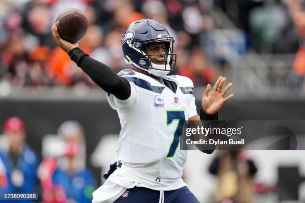 Geno Smith of the Seattle Seahawks throws a pass in the first quarter against the Cincinnati Bengals at Paycor Stadium on October 15, 2023 in...