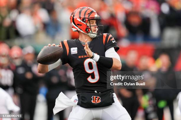 Joe Burrow of the Cincinnati Bengals throws a pass in the fourth quarter against the Seattle Seahawks at Paycor Stadium on October 15, 2023 in...