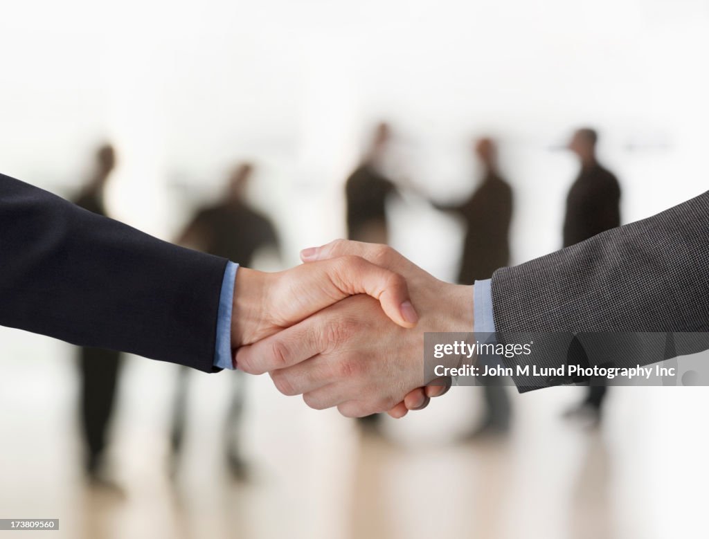 Close up of businessmen shaking hands