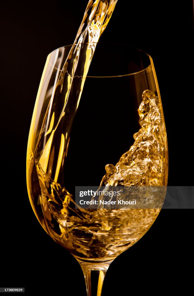 Wine pouring into wine glass