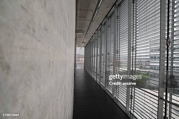 modern architecture with glass and concrete - jalousie stockfoto's en -beelden