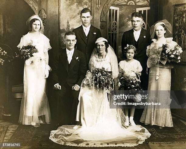 old sepia photograph of a group at a wedding - wedding photography stock pictures, royalty-free photos & images