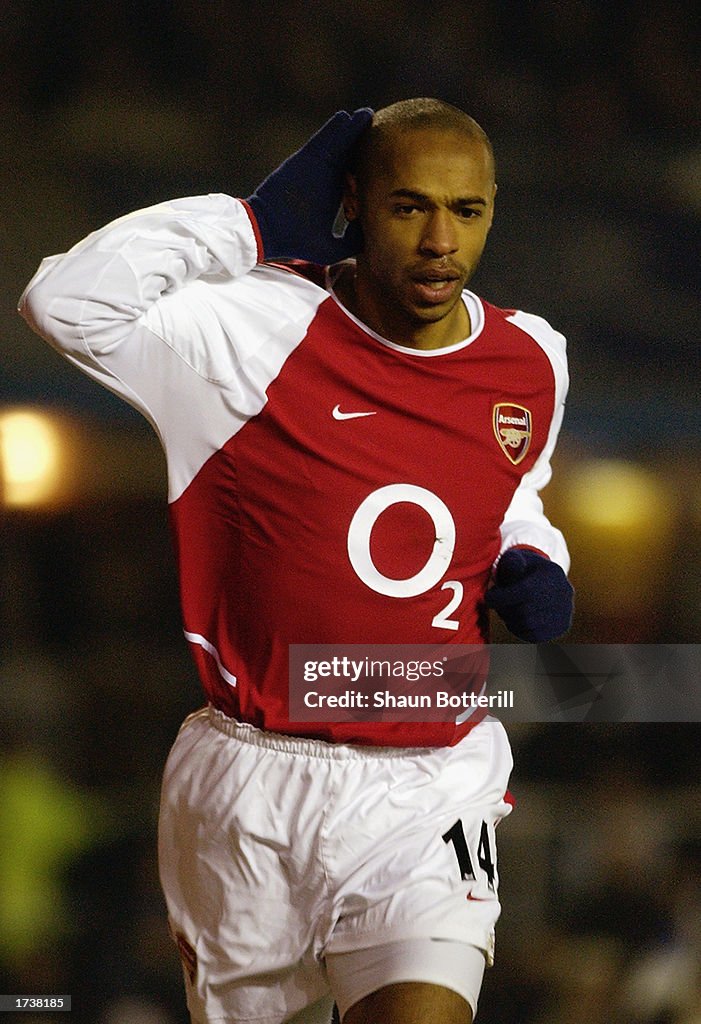 Thierry Henry of Arsenal celebrates scoring Arsenal's opening goal