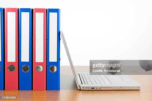 ring binders and laptop - archival office stock pictures, royalty-free photos & images