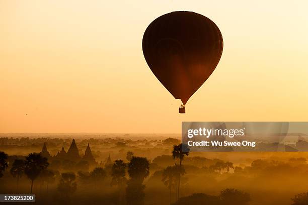 balloon over bagan - bagan stock pictures, royalty-free photos & images