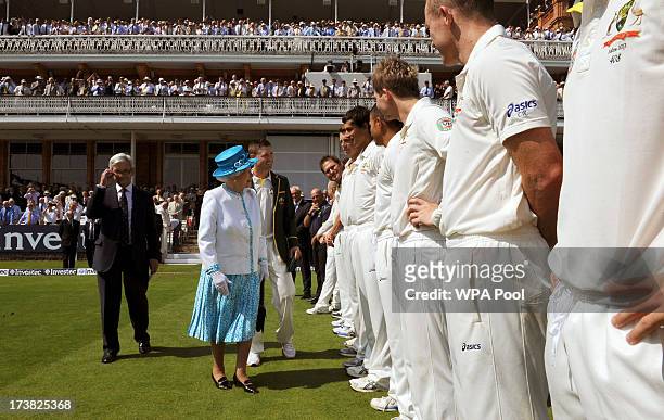 Queen Elizabeth II meets the Australian players ahead of the first day of the second test between England and Australia at Lord's Cricket Ground on...