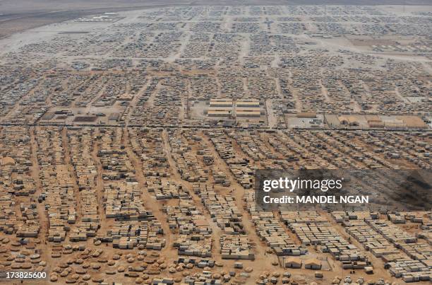 An aerial view shows the Zaatari refugee camp on July 18, 2013 near the Jordanian city of Mafraq, some 8 kilometers from the Jordanian-Syrian border....