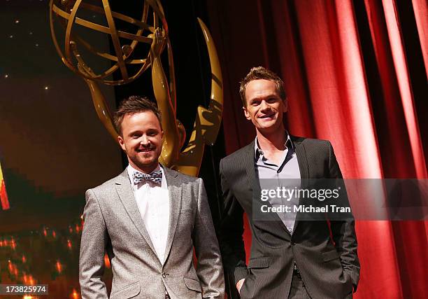 Aaron Paul and Neil Patrick Harris attend the 65th Primetime EMMY Awards nominations announcement held at Leonard H. Goldenson Theatre on July 18,...