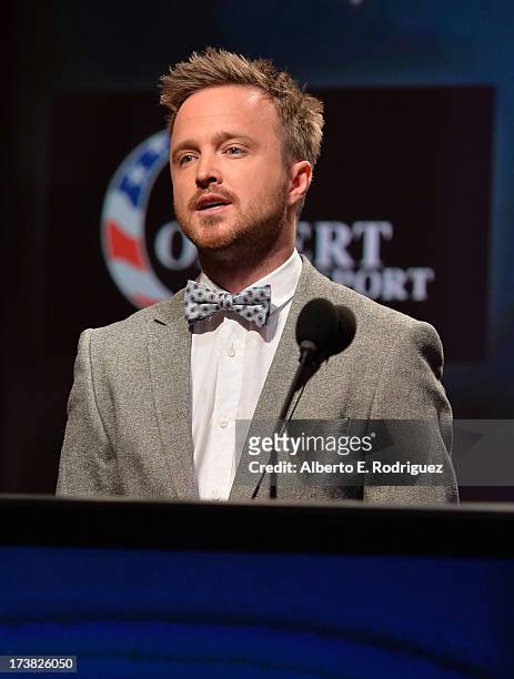Actor Aaron Paul announces the nominees for the 65th Primetime Emmy Awards nominations at the Television Academy's Leonard H. Goldenson Theatre on...
