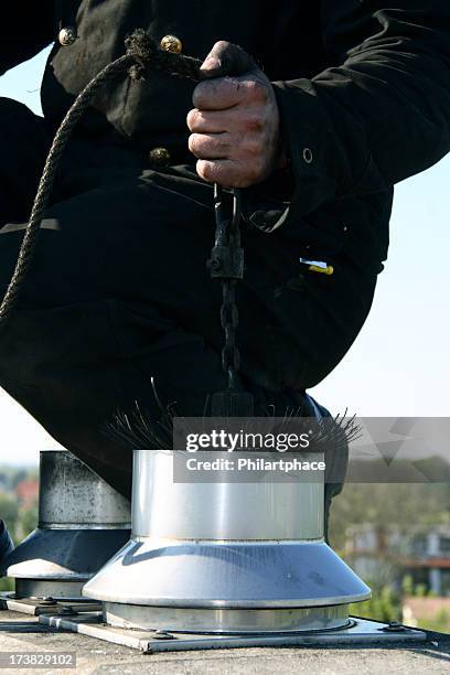 close up of a chimney sweep on the roof - chimney bildbanksfoton och bilder