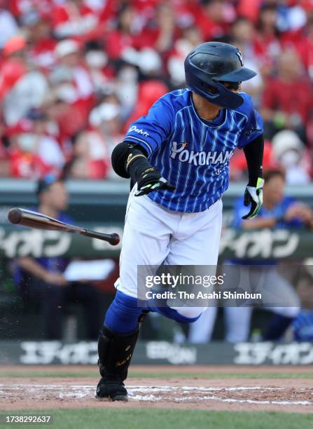 Taiki Sekine of the Yokohama DeNA Baystars hits a RBI single in the 7th inning against Hiroshima Carp during the Central League Climax Series first...