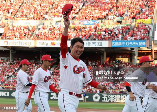 Head coach Takahiro Arai of Hiroshima Carp applauds fans after the team's 4-2 victory against Yokohama DeNA Baystars and going through to the final...