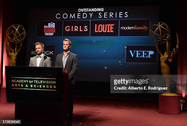 Actors Aaron Paul and Neil Patrick Harris announce the nominees for the Outstanding Comedy Series Award during the 65th Primetime Emmy Awards...