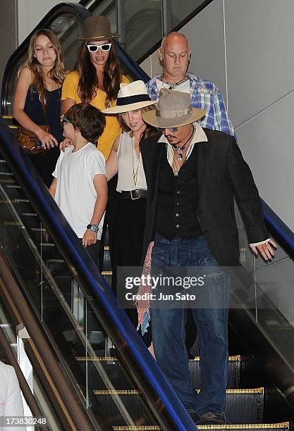 Johnny Depp, Amber Heard, Jack Depp and Lily Rose Melody Depp are seen upon departure at Narita International Airport on July 18, 2013 in Narita,...