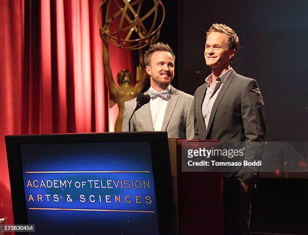 Actors Aaron Paul and Neil Patrick Harris speak onstage during the 65th Primetime Emmy Awards nominations at the Television Academy's Leonard H....