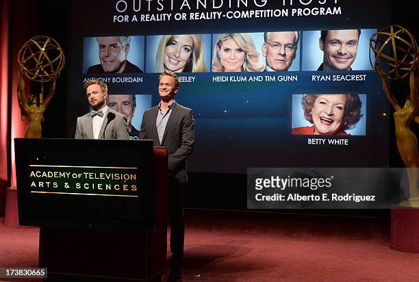 Actors Aaron Paul and Neil Patrick Harris announce the nominees for the Outstanding Host for a Reality or Reality-Competition Program Award during...