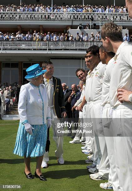 Queen Elizabeth II speaks with Australia's Ashton Agar ahead of the first day of the second test between England and Australia at Lord's Cricket...