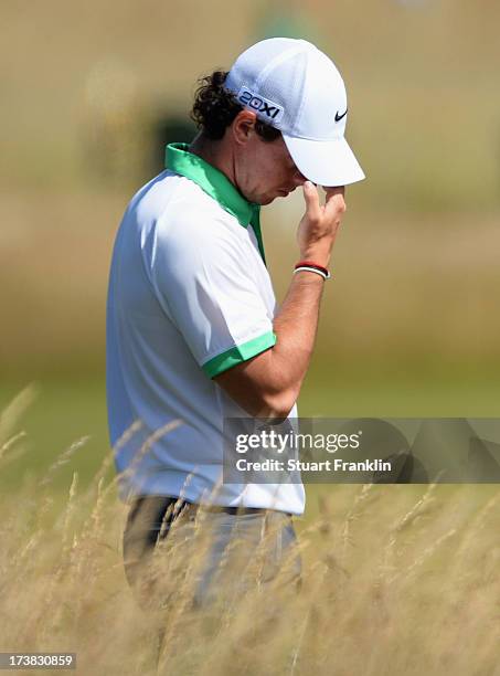 Rory McIlroy of Northern Ireland looks dejected on the 14th hole during the first round of the 142nd Open Championship at Muirfield on July 18, 2013...