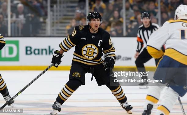 Brad Marchand of the Boston Bruins looks on against the Nashville Predators during the first period at the TD Garden on October 14, 2023 in Boston,...