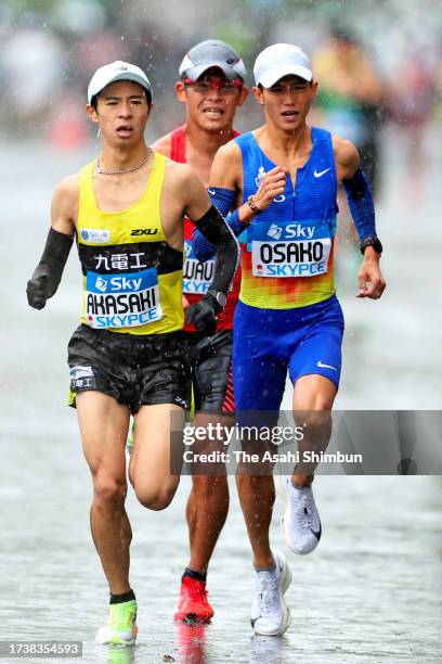 Akira Akasaki, Suguru Osako and Yuki Kawauchi compete in the Men's race of the Marathon Grand Championship on October 15, 2023 in Tokyo, Japan.