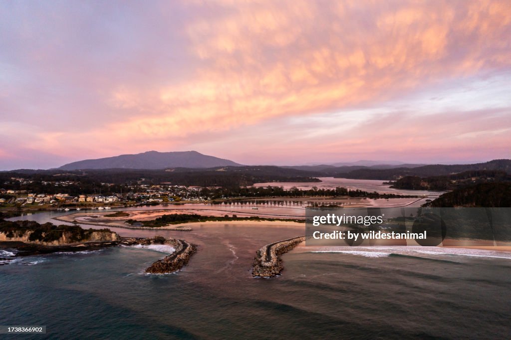 Aerial view of the town of Narooma in NSW at sunrise.