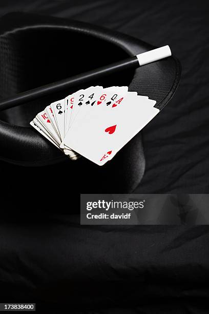 magic hat, cane and cards - magician cards stock pictures, royalty-free photos & images