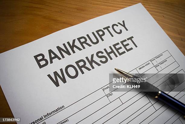 bankruptcy worksheet - bankruptcy law stock pictures, royalty-free photos & images