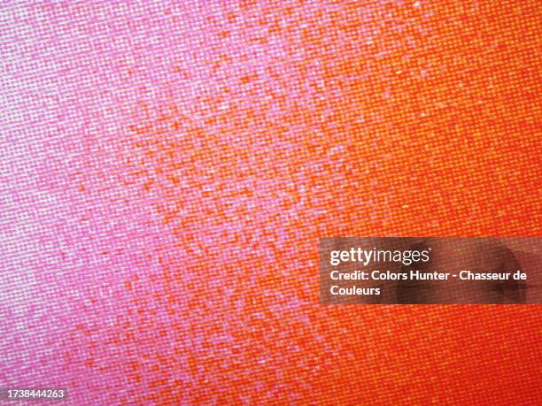 very close-up of a poster printed in pink, orange and red tones using the offset technique in paris, france - grafische afdruk stockfoto's en -beelden