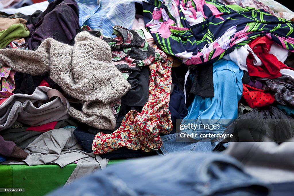 Clothing at an outdoor flea market street stall