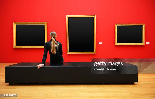 woman in a museum (clipping path) - exhibition hall stock pictures, royalty-free photos & images