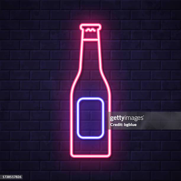 beer bottle. glowing neon icon on brick wall background - cider stock illustrations