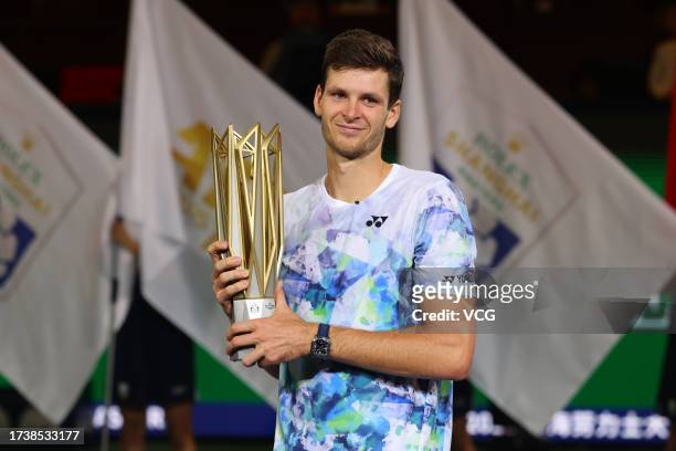 Hubert Hurkacz of Poland celebrates with the champion trophy after defeating Andrey Rublev in the Men's Singles Final match on Day 14 of 2023...