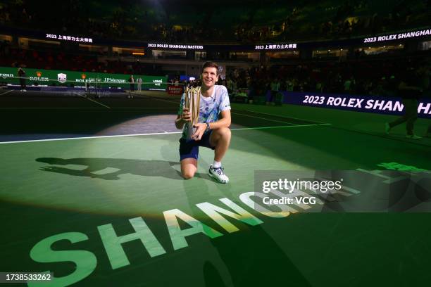 Hubert Hurkacz of Poland celebrates with the champion trophy after defeating Andrey Rublev in the Men's Singles Final match on Day 14 of 2023...