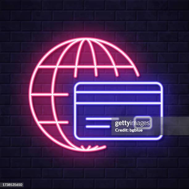 international payment. glowing neon icon on brick wall background - pos material stock illustrations