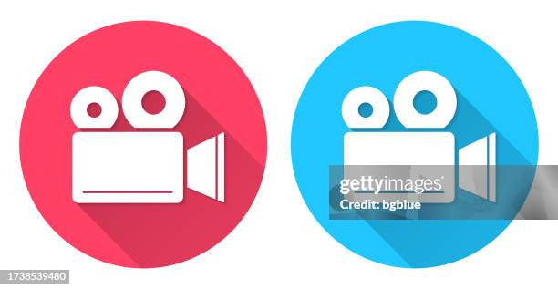 movie camera. round icon with long shadow on red or blue background - film projector stock illustrations