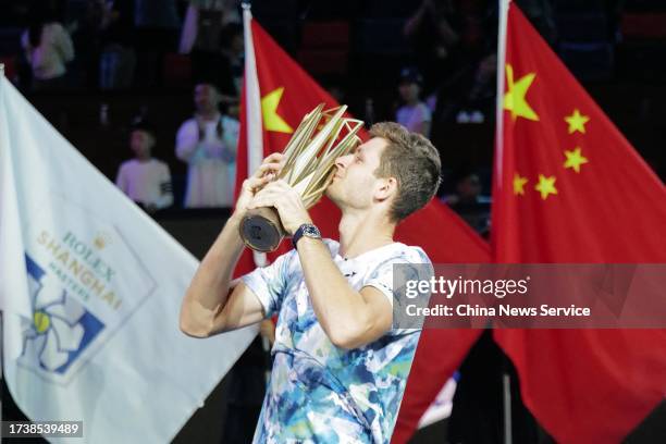 Hubert Hurkacz of Poland celebrates with the champion trophy after defeating Andrey Rublev in the Men's Singles Final match on Day 14 of 2023...