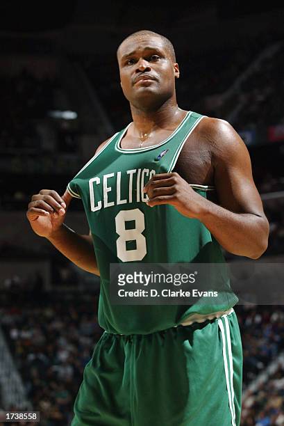 Antoine Walker of the Boston Celtics tugs on his uniform during the NBA game against the San Antonio Spurs at SBC Center on January 12, 2003 in San...
