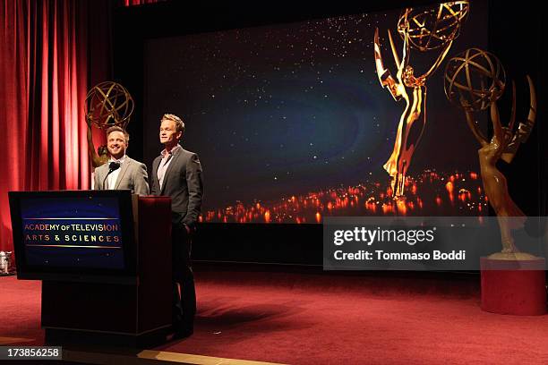 Actors Aaron Paul and Neil Patrick Harris speak onstage during the 65th Primetime Emmy Awards nominations at the Television Academy's Leonard H....