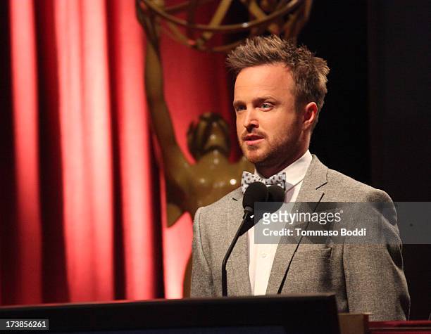 Actor Aaron Paul speaks onstage during the 65th Primetime Emmy Awards nominations at the Television Academy's Leonard H. Goldenson Theatre on July...
