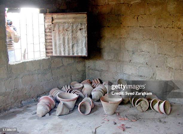 Photographer takes pictures of a room January 22, 2003 where police found the remains of "Wall Street Journal" reporter Daniel Pearl's body on an...