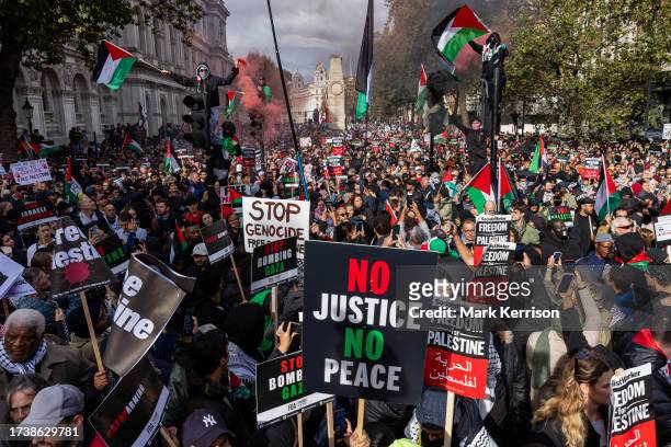 Pro-Palestinian protesters attend a rally close to Downing Street in support of the Palestinian population of Gaza on 21st October 2023 in London,...