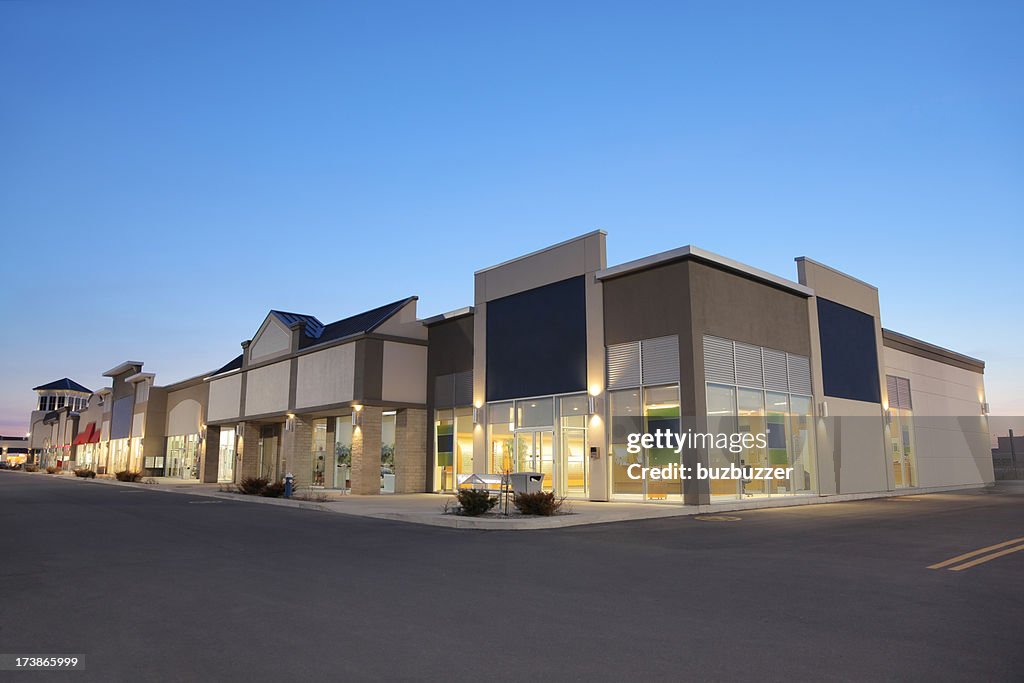 Strip Mall Store Building Exteriors at Sunset