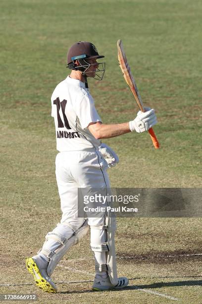 Cameron Bancroft of Western Australia raises his bat after reaching his half century during Day 2 of the Sheffield Shield match between Western...
