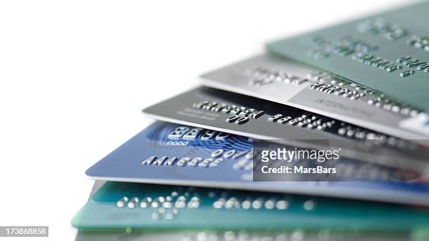 credit cards close up - credit card and stapel stockfoto's en -beelden