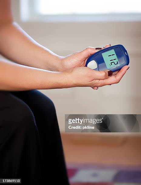 blood sugar test at home - altitude sickness stock pictures, royalty-free photos & images