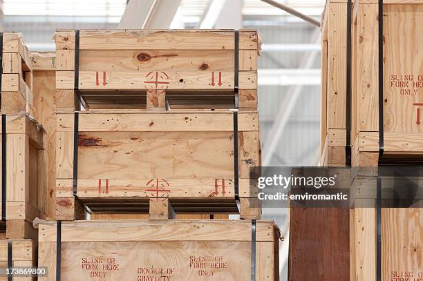 wooden crates in a storage warehouse. - wooden box stockfoto's en -beelden